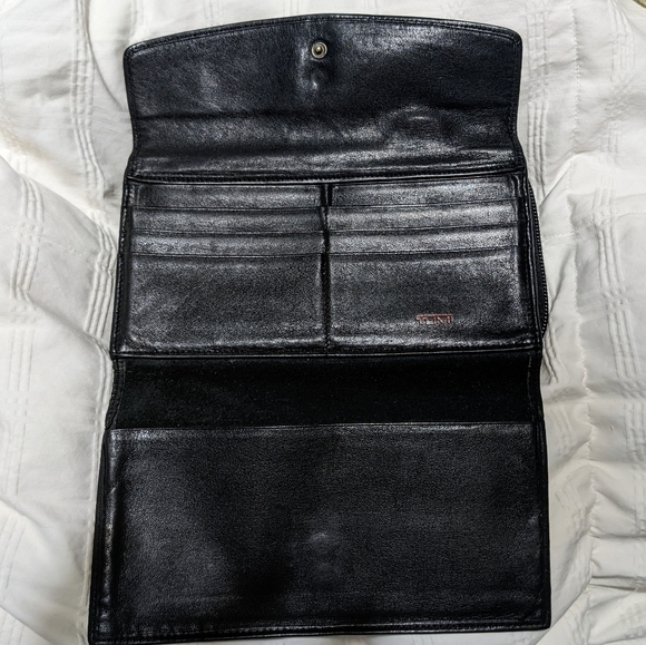 Tumi Handbags - vintage Tumi zip around wallet l